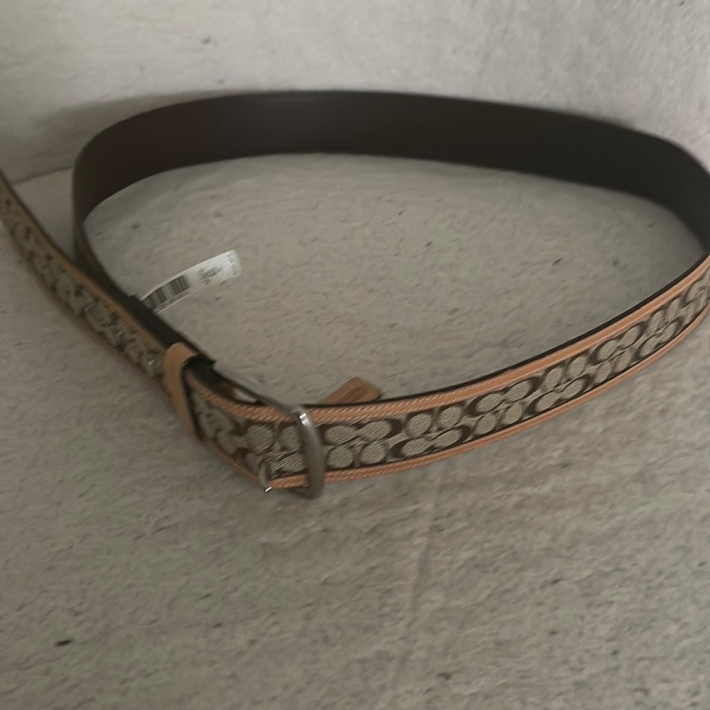 Cute authentic belt too match your coach ensemble